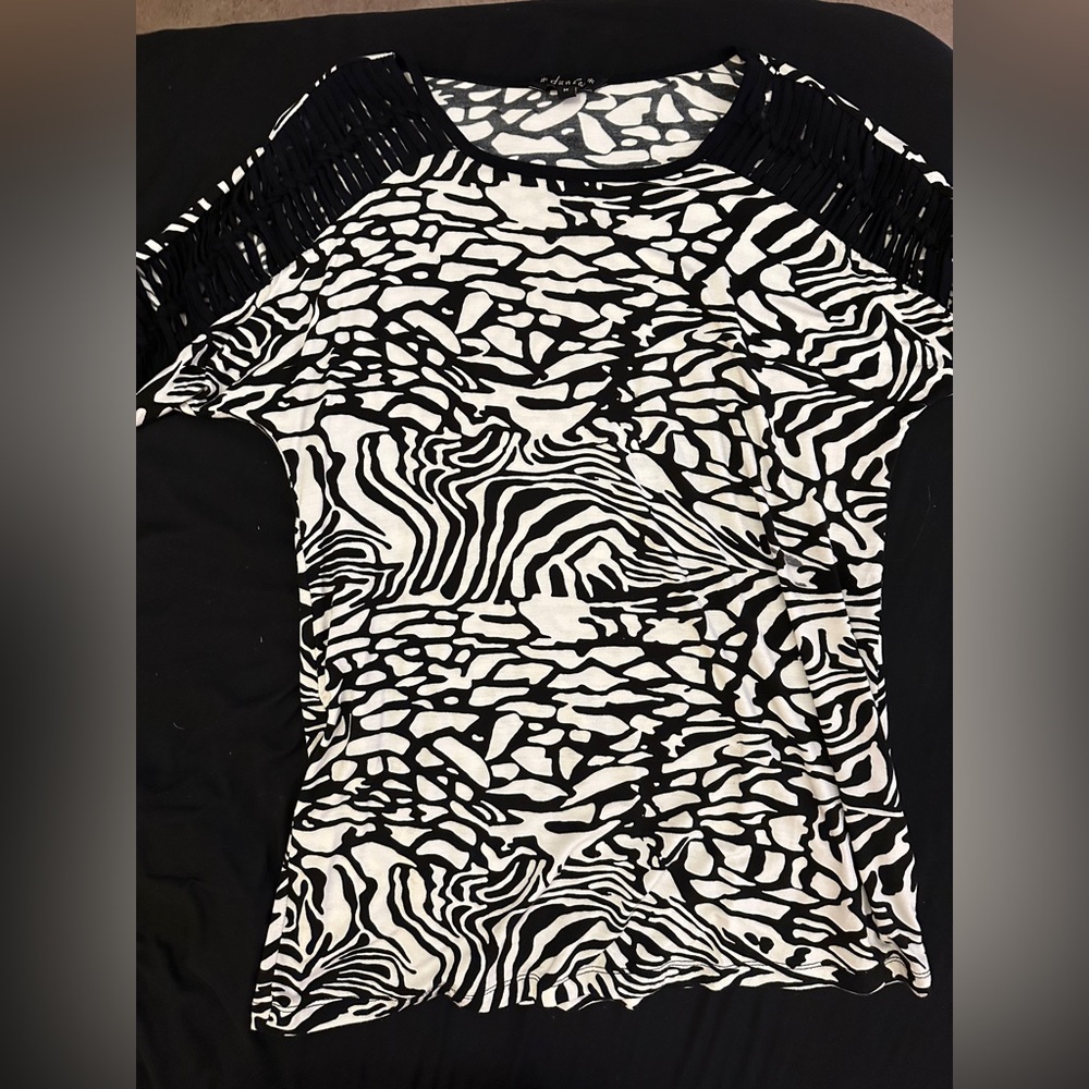 Top with detail on sleeves